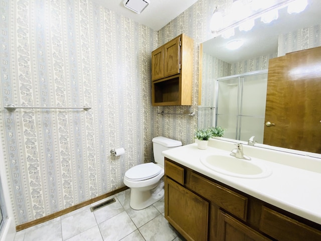 540 S Hickory Dr, Springfield, MO 65809 - full bathroom with wallpapered walls, a stall shower, vanity, toilet, and tile patterned floors