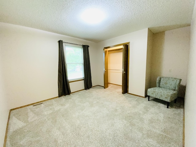 540 S Hickory Dr, Springfield, MO 65809 - unfurnished bedroom with a textured ceiling, light carpet, and baseboards