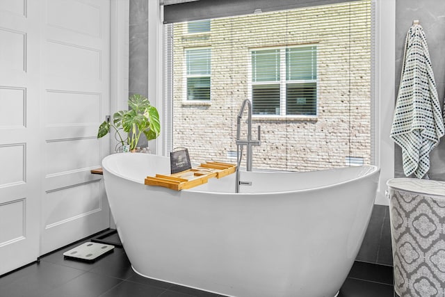 518 N Dublin Dr, Nixa, MO 65714 - full bath with tile patterned flooring and a freestanding bath