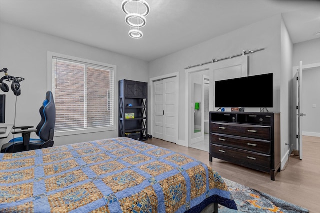 518 N Dublin Dr, Nixa, MO 65714 - bedroom featuring wood finished floors and baseboards