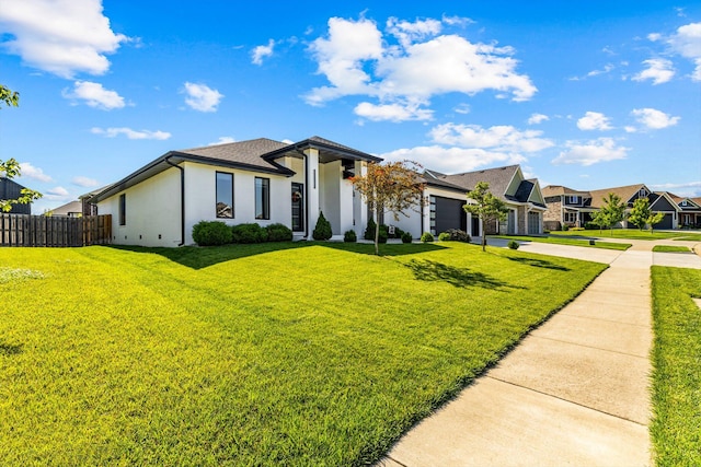518 N Dublin Dr, Nixa, MO 65714 - view of front facade featuring driveway, a garage, and a residential view