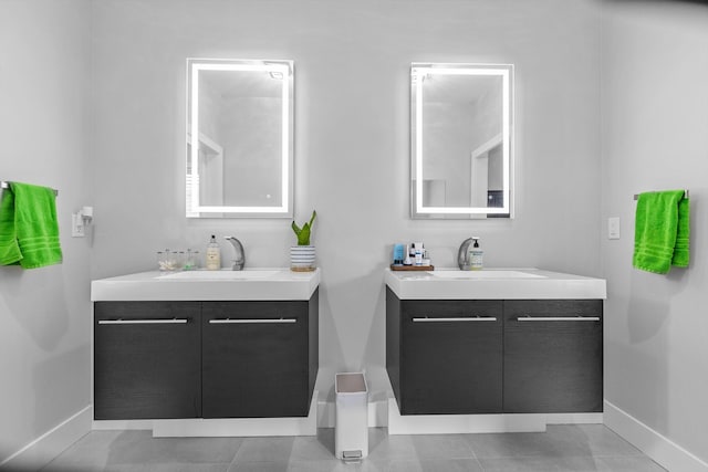 518 N Dublin Dr, Nixa, MO 65714 - bathroom with two vanities and baseboards