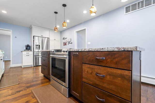 4159 N Farm Rd Unit 173, Springfield, MO 65803 - kitchen with stainless steel appliances, white cabinetry, recessed lighting, dark wood-type flooring, and light stone counters