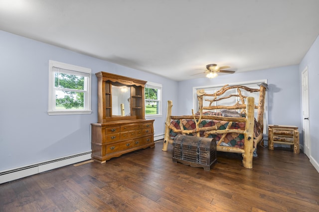 4159 N Farm Rd Unit 173, Springfield, MO 65803 - bedroom with a baseboard radiator, multiple windows, and wood-type flooring
