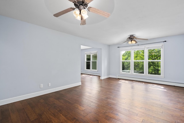 4159 N Farm Rd Unit 173, Springfield, MO 65803 - spare room featuring ceiling fan, a baseboard radiator, hardwood / wood-style floors, baseboards, and a baseboard heating unit