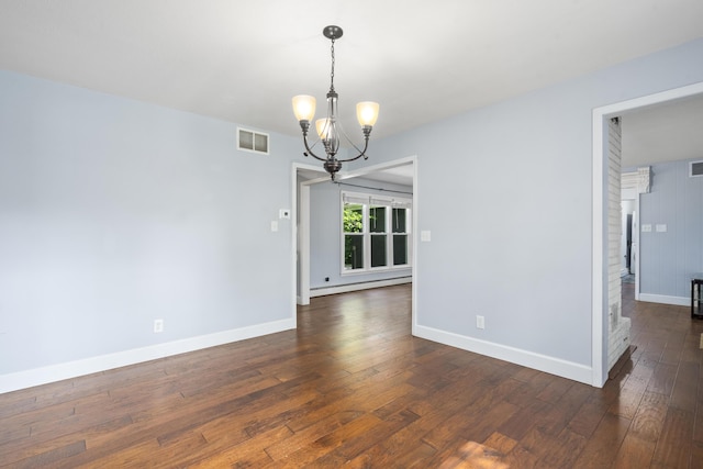 4159 N Farm Rd Unit 173, Springfield, MO 65803 - spare room featuring a chandelier, dark wood-style floors, a baseboard heating unit, and baseboards