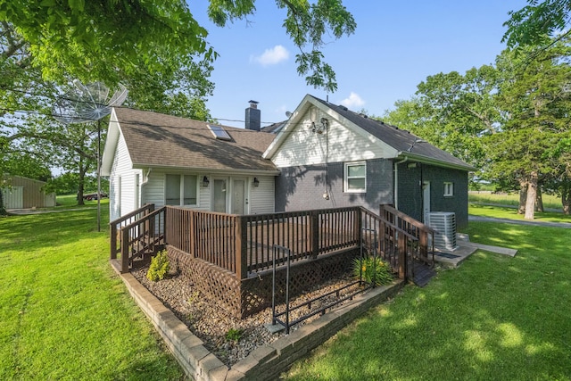 4159 N Farm Rd Unit 173, Springfield, MO 65803 - rear view of property featuring a lawn, central air condition unit, a chimney, a deck, and roof with shingles