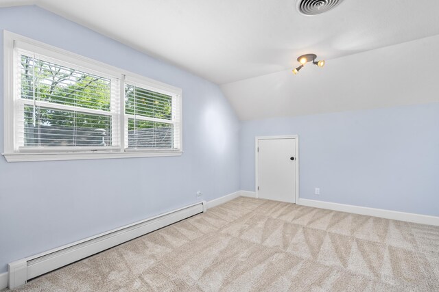 4159 N Farm Rd Unit 173, Springfield, MO 65803 - bonus room featuring baseboard heating, lofted ceiling, carpet flooring, and baseboards