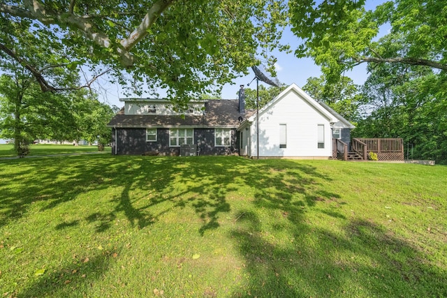 4159 N Farm Rd Unit 173, Springfield, MO 65803 - back of property featuring a yard and a deck