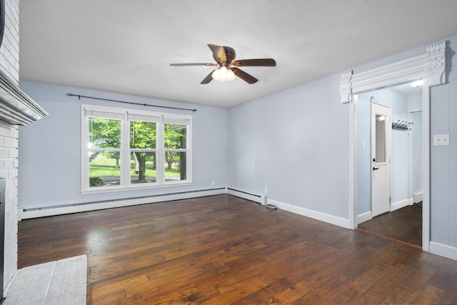 4159 N Farm Rd Unit 173, Springfield, MO 65803 - spare room featuring ceiling fan, dark wood-style floors, baseboard heating, and baseboards