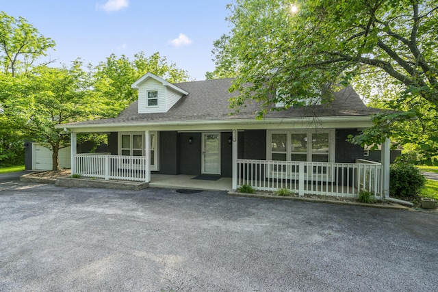 4159 N Farm Rd Unit 173, Springfield, MO 65803 - view of front facade with covered porch and roof with shingles