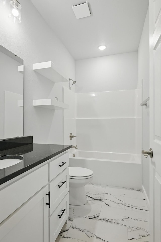 406 Barton Pl, Neosho, MO 64850 - full bath featuring vanity, toilet, bathing tub / shower combination, marble finish floors, and recessed lighting