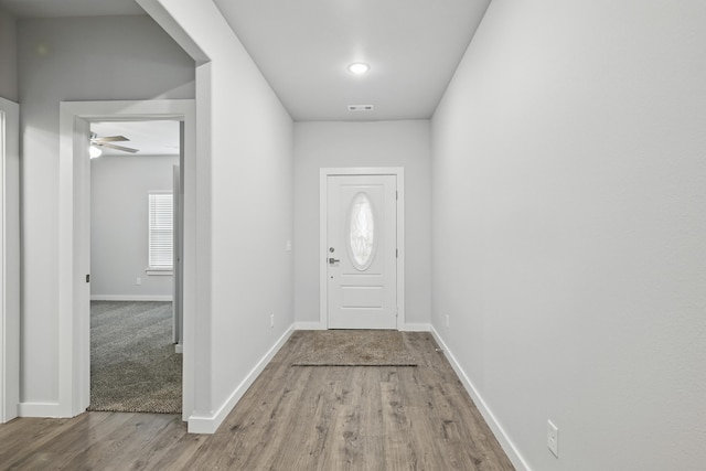 406 Barton Pl, Neosho, MO 64850 - doorway featuring wood finished floors, baseboards, and ceiling fan