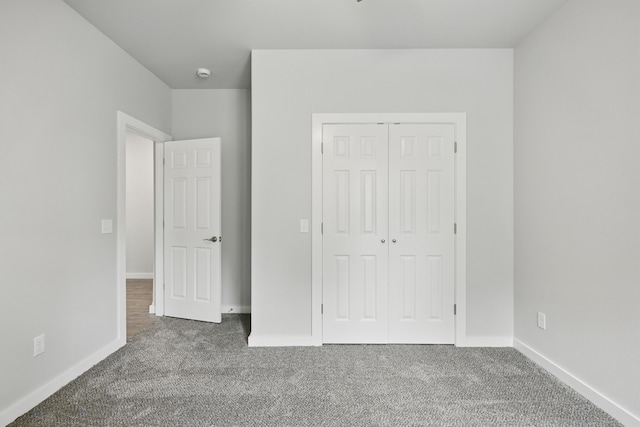 406 Barton Pl, Neosho, MO 64850 - unfurnished bedroom with carpet floors, a closet, and baseboards