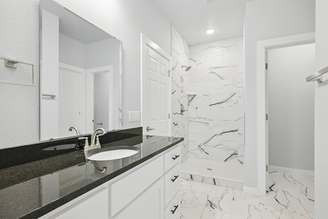 406 Barton Pl, Neosho, MO 64850 - full bathroom featuring marble look tile flooring, vanity, a marble finish shower, recessed lighting, and baseboards