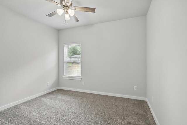 406 Barton Pl, Neosho, MO 64850 - carpeted spare room with baseboards and ceiling fan