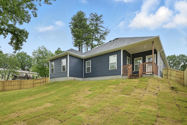 406 Barton Pl, Neosho, MO 64850 - rear view of property featuring covered porch and roof with shingles