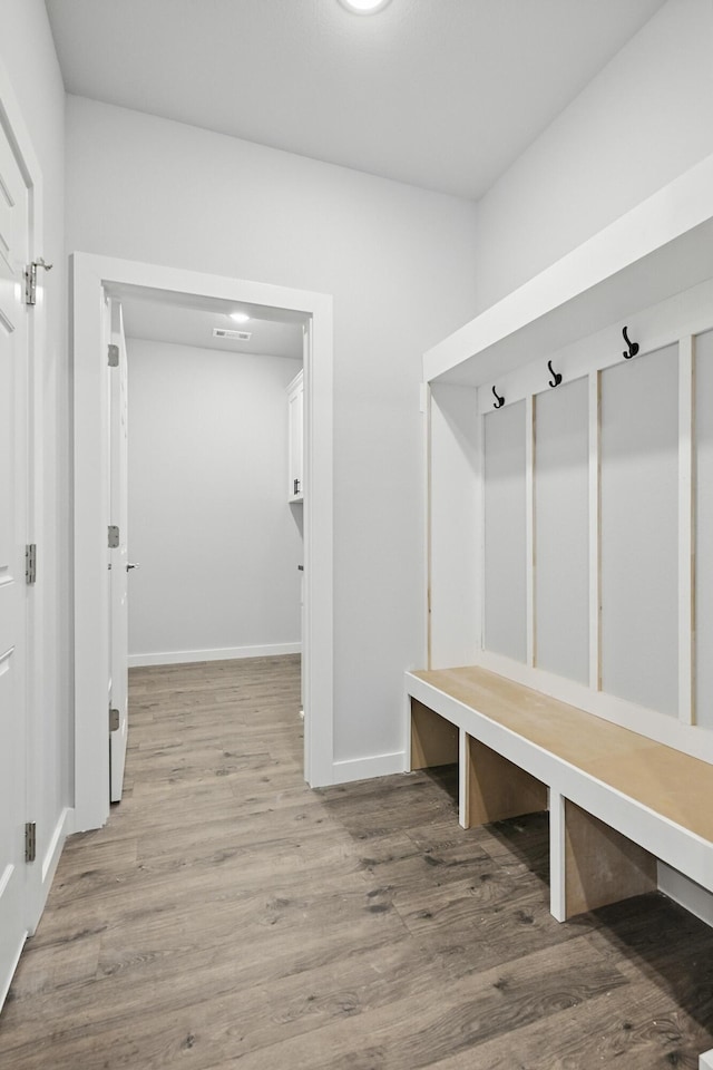 406 Barton Pl, Neosho, MO 64850 - mudroom featuring wood finished floors and baseboards