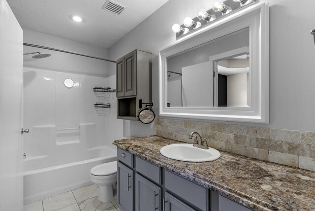 2236 E Logan St, Republic, MO 65738 - bathroom with vanity, toilet, bathing tub / shower combination, backsplash, and recessed lighting