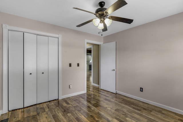 2236 E Logan St, Republic, MO 65738 - unfurnished bedroom with wood finished floors, baseboards, a closet, and ceiling fan