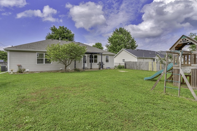 2236 E Logan St, Republic, MO 65738 - rear view of property featuring a playground, cooling unit, and roof with shingles