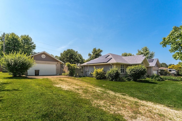 4501 N 16th St, Ozark, MO 65721 - view of side of property with an outdoor structure and a detached garage