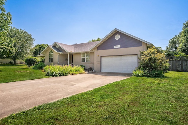 4501 N 16th St, Ozark, MO 65721 - ranch-style home featuring an attached garage, concrete driveway, and stucco siding
