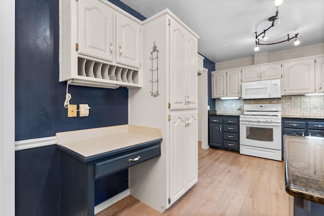 4501 N 16th St, Ozark, MO 65721 - kitchen with white appliances, white cabinets, backsplash, and light wood-type flooring