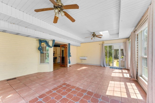 4501 N 16th St, Ozark, MO 65721 - unfurnished sunroom featuring ceiling fan and a skylight