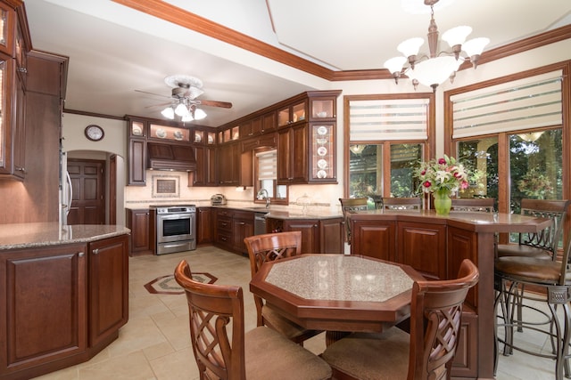117 Hidden Shores Dr, Branson West, MO 65737 - kitchen featuring stainless steel appliances, ornamental molding, glass insert cabinets, a chandelier, and a ceiling fan