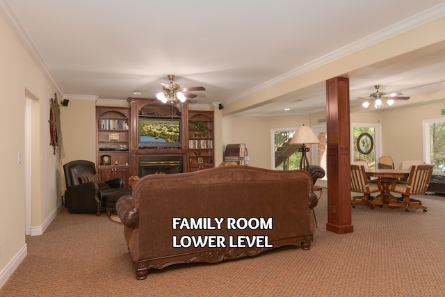 117 Hidden Shores Dr, Branson West, MO 65737 - living room with ceiling fan, carpet floors, a fireplace, crown molding, and baseboards