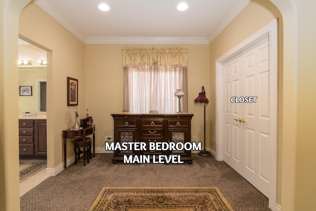 117 Hidden Shores Dr, Branson West, MO 65737 - bedroom with crown molding, dark colored carpet, recessed lighting, connected bathroom, and baseboards