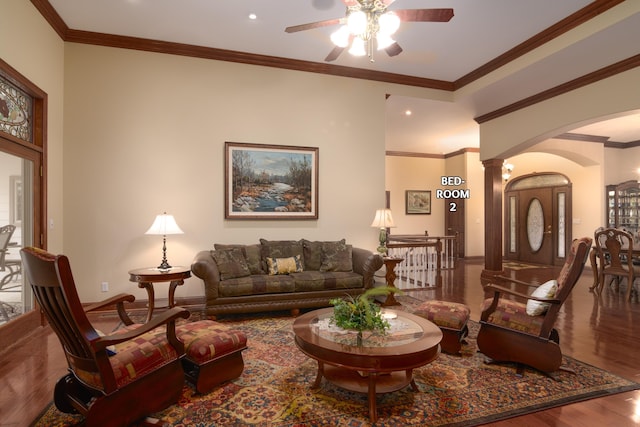 117 Hidden Shores Dr, Branson West, MO 65737 - living room with arched walkways, ceiling fan, wood finished floors, crown molding, and recessed lighting