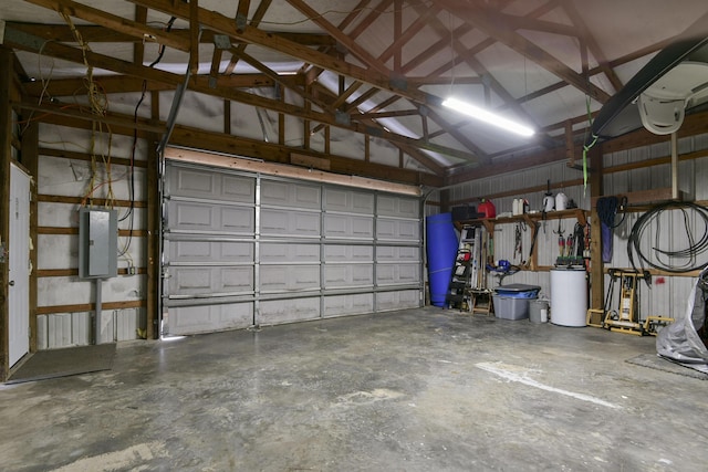 145 Allison Bnd, Lampe, MO 65681 - garage featuring electric panel and metal wall