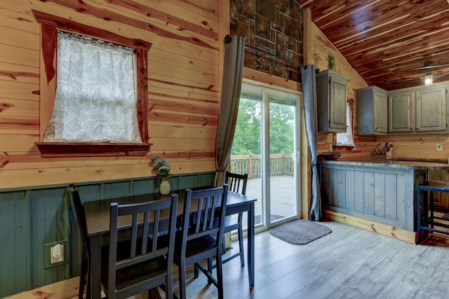 145 Allison Bnd, Lampe, MO 65681 - kitchen with wood walls, wooden ceiling, lofted ceiling, and light wood-type flooring