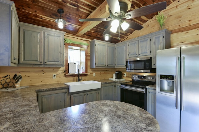 145 Allison Bnd, Lampe, MO 65681 - kitchen with appliances with stainless steel finishes, a sink, a ceiling fan, wood walls, and wood ceiling
