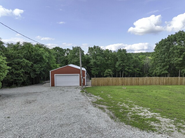 145 Allison Bnd, Lampe, MO 65681 - detached garage with a forest view