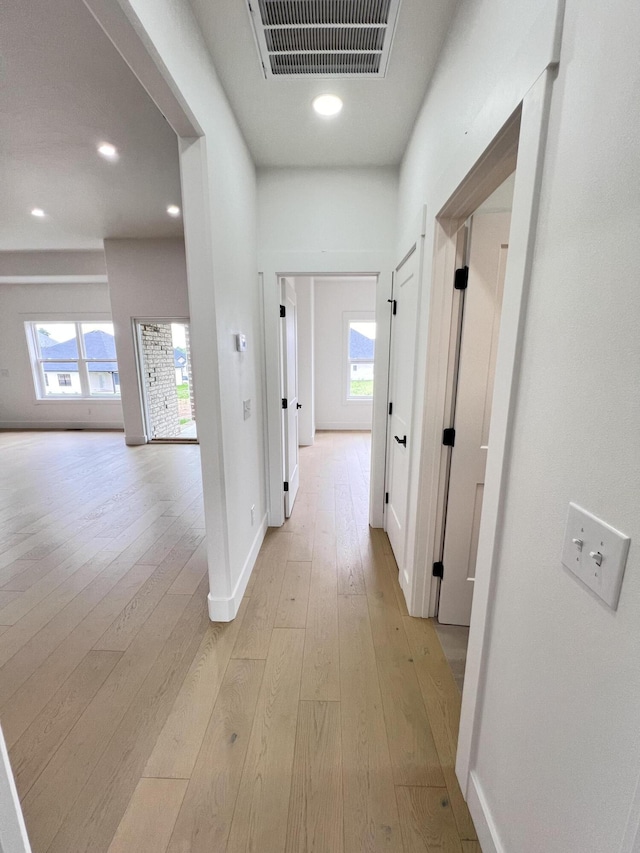 2090 N Silver Charm Ave, Springfield, MO 65802 - corridor featuring light wood finished floors, baseboards, and recessed lighting