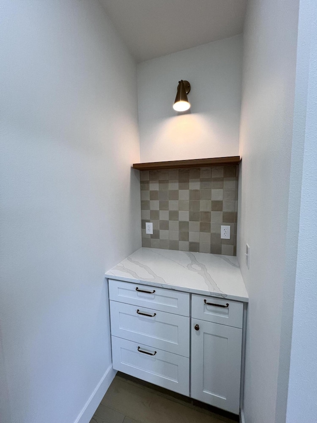 2090 N Silver Charm Ave, Springfield, MO 65802 - detailed view of decorative backsplash and baseboards
