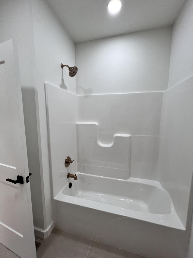 2090 N Silver Charm Ave, Springfield, MO 65802 - bathroom featuring bathing tub / shower combination and tile patterned flooring