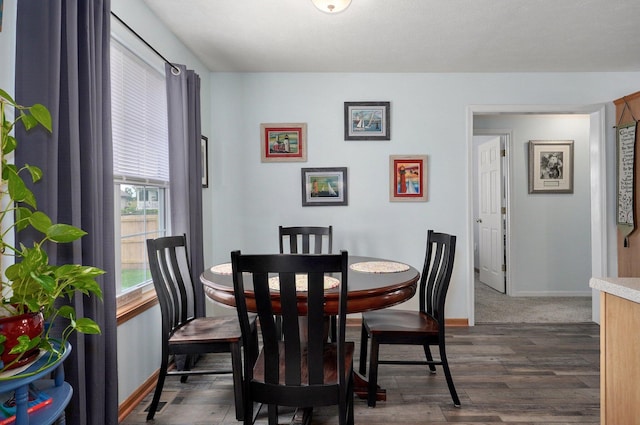 920 Bradford Ct, Marshfield, MO 65706 - dining area featuring dark wood-type flooring and baseboards