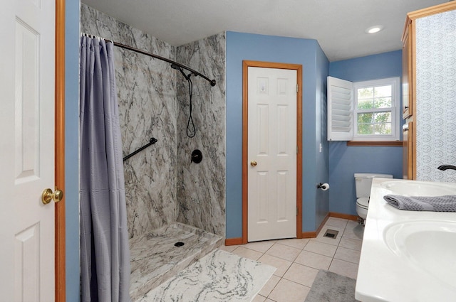 920 Bradford Ct, Marshfield, MO 65706 - bathroom with a sink, tile patterned flooring, curtained shower, and toilet