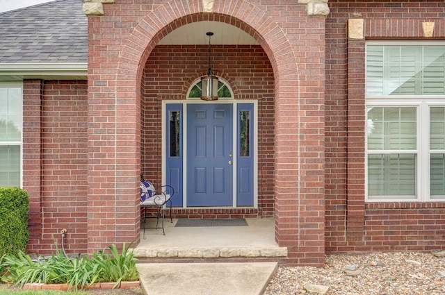 920 Bradford Ct, Marshfield, MO 65706 - entrance to property featuring brick siding and roof with shingles