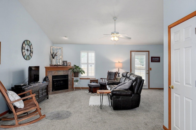 920 Bradford Ct, Marshfield, MO 65706 - carpeted living area featuring ceiling fan, baseboards, and a tile fireplace