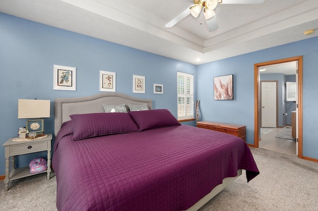 920 Bradford Ct, Marshfield, MO 65706 - bedroom featuring carpet flooring, baseboards, ceiling fan, and a tray ceiling