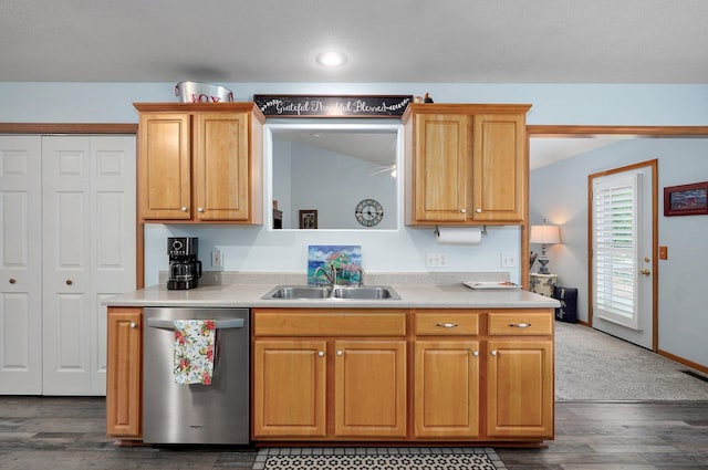 920 Bradford Ct, Marshfield, MO 65706 - kitchen with dishwasher, a sink, dark wood-style flooring, light countertops, and recessed lighting