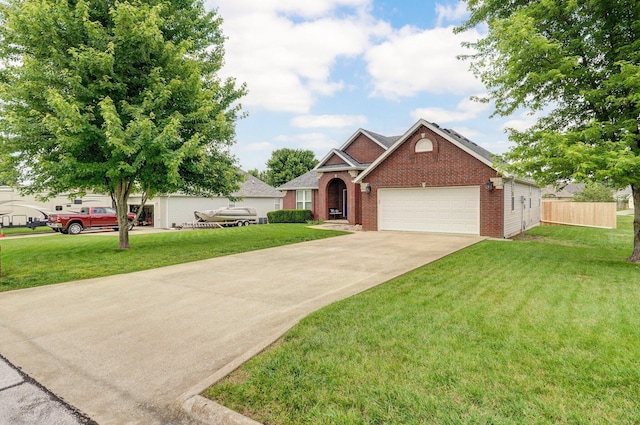 920 Bradford Ct, Marshfield, MO 65706 - view of front facade with brick siding, driveway, and a garage