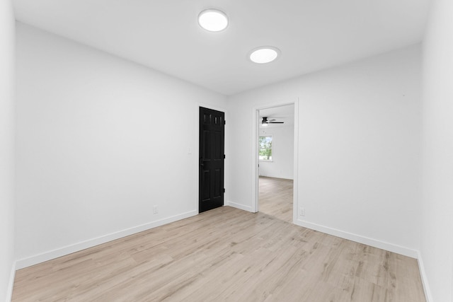 26237 Twin Rivers Dr, Shell Knob, MO 65747 - empty room with light wood finished floors and baseboards