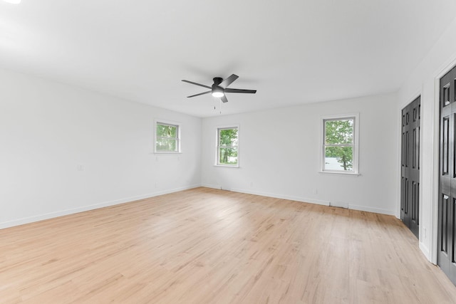 26237 Twin Rivers Dr, Shell Knob, MO 65747 - unfurnished room featuring light wood-style floors, ceiling fan, and baseboards