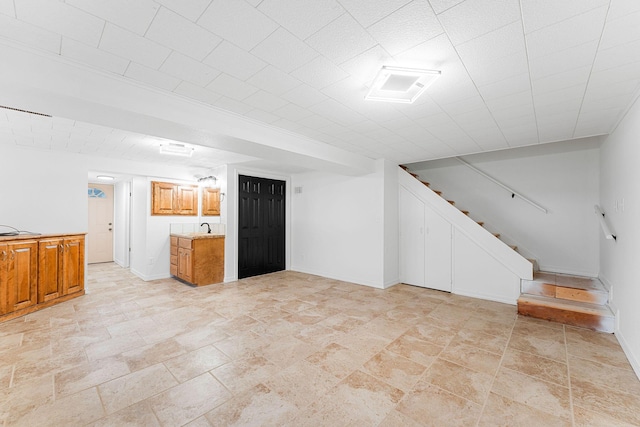 26237 Twin Rivers Dr, Shell Knob, MO 65747 - finished basement featuring stairs, baseboards, and light stone finish flooring